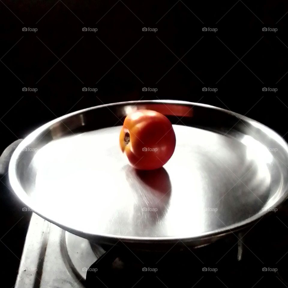 Tomato on a steel plate