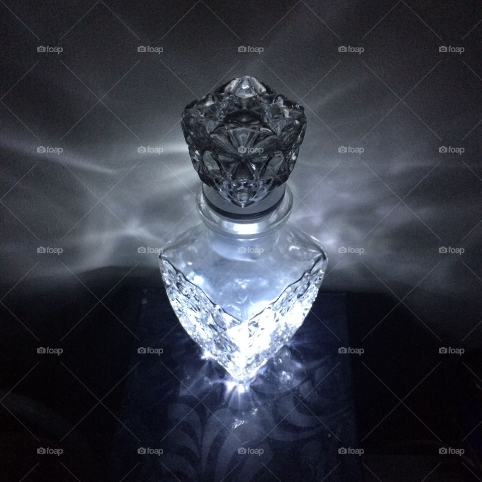 Glowing glass bottle