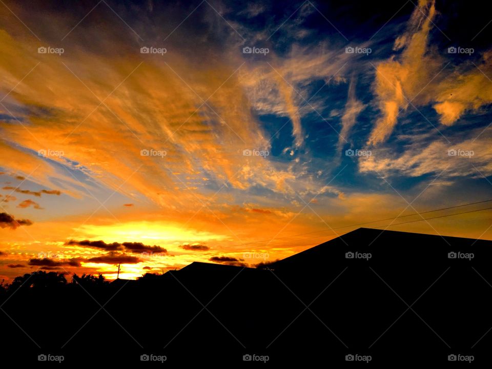 Silhouette of house during in sunset
