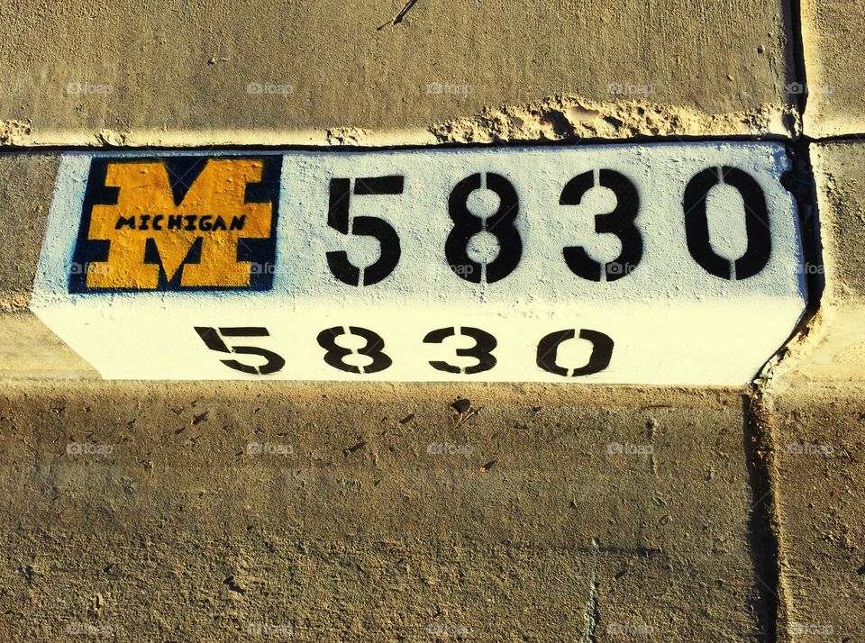 Street number with the logo of the university of Michigan