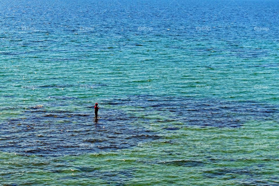 Lonely fisherman. Lonely fisherman