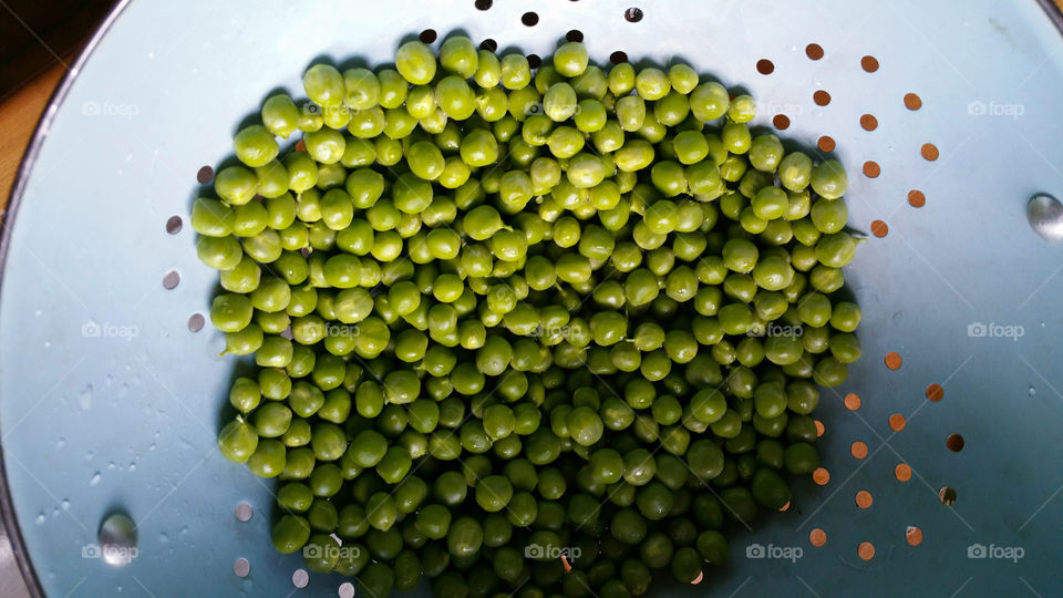 Freshly Washed Peas in the colander