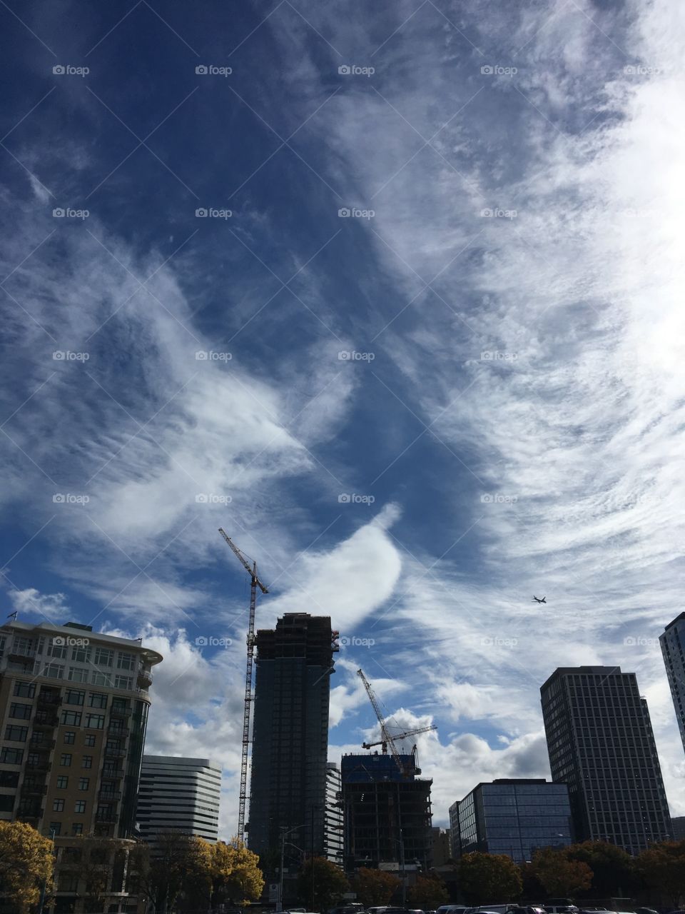 Sky scrapers in Seattle under clouds 