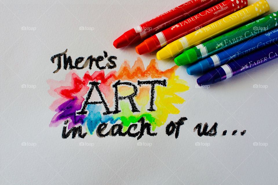 Colours of the World - watercolor crayons on mixed-media wire-bound paper next to watercolor-crayon-embellished phrase “There’s art in each of us...”