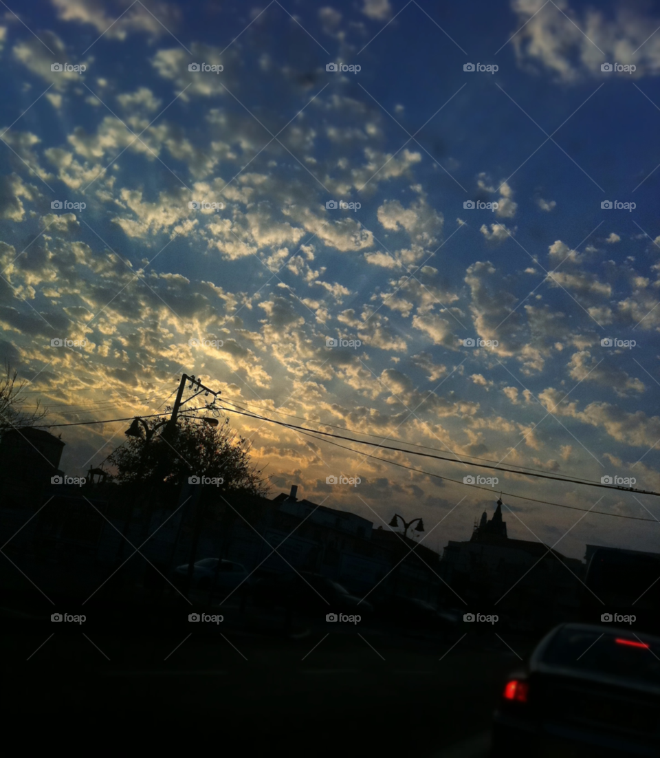 tel aviv jaffa car sunset clouds by ktf