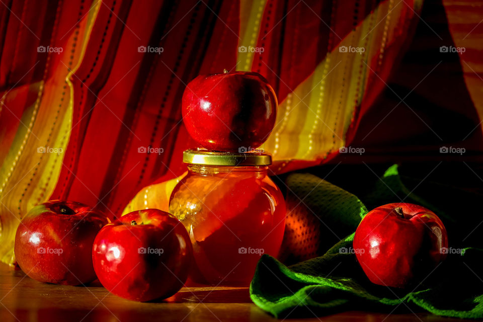 Still life with apples and honey