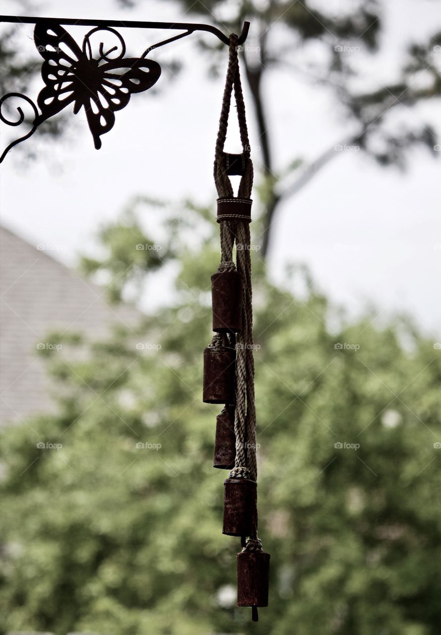 Wind chimes waiting for a chance to sing their song on a Spring afternoon