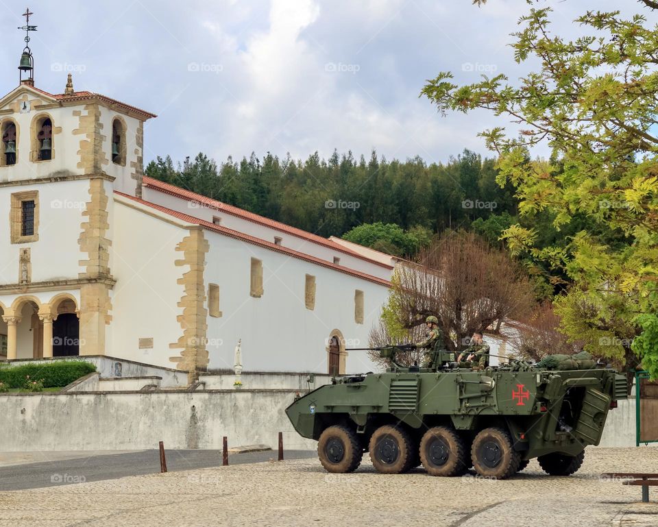 Military tanks and church bells