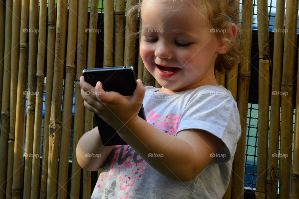 Kid with smartphone