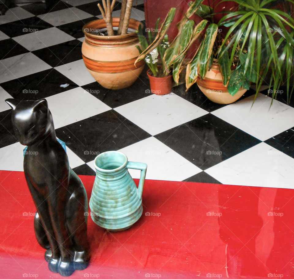 Cat sculpture and some houseplants