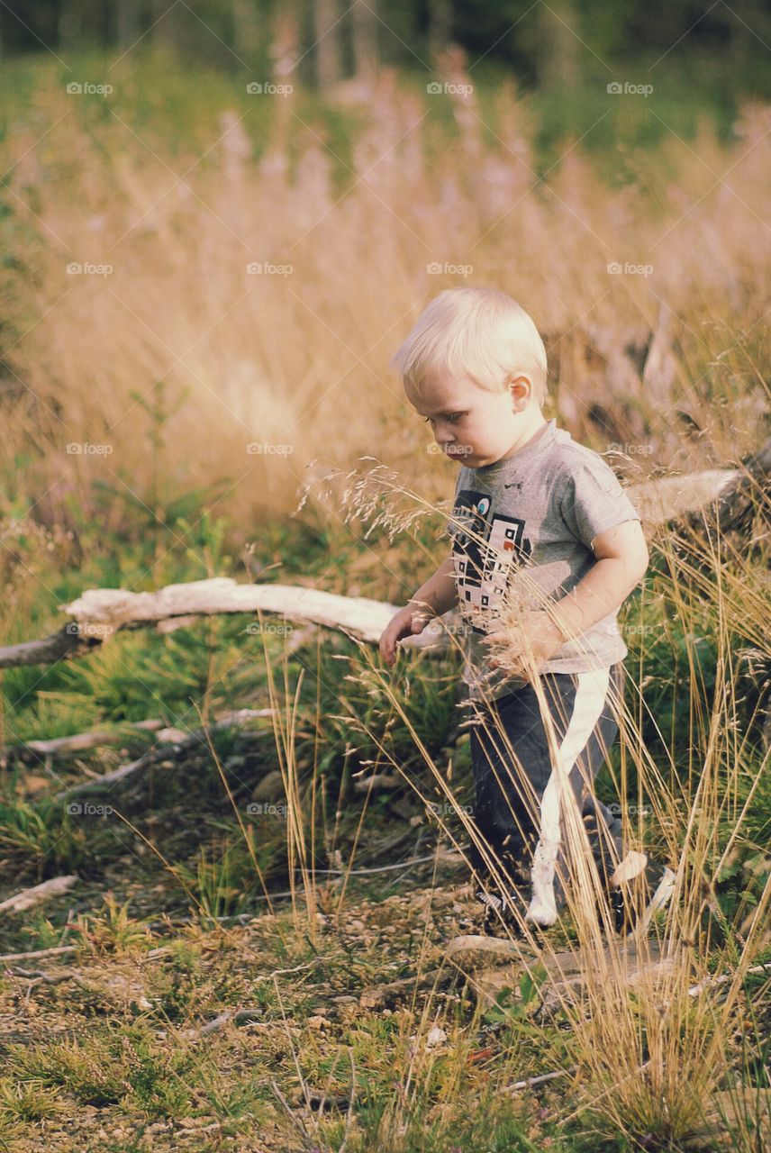 Little boy having fun outdoors