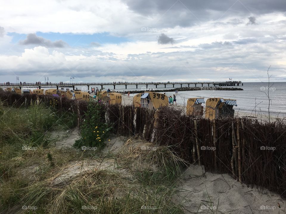 Beach baskets under overcast sky