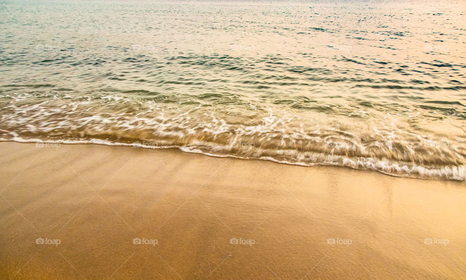 Close-up of wave on beach