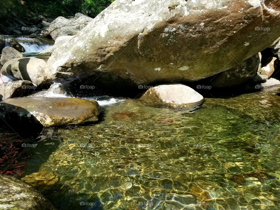 Marveled clear waters of reflection & naturally massive rocks at The Chimeys, Great Smoky Mountains National Park.