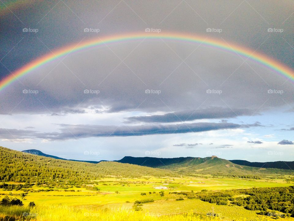 Rainbow over valley