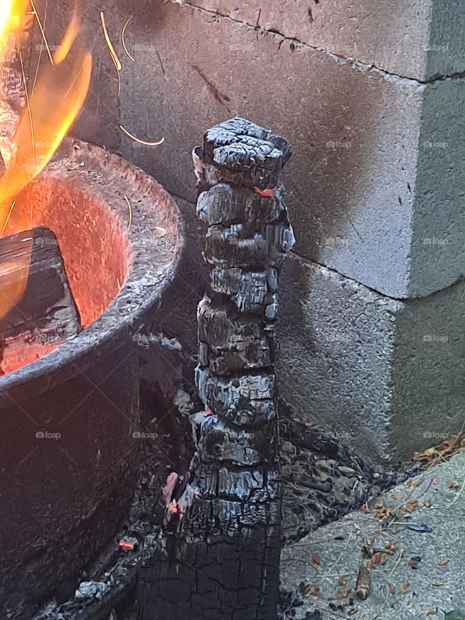 a piece of coal fell out of fire