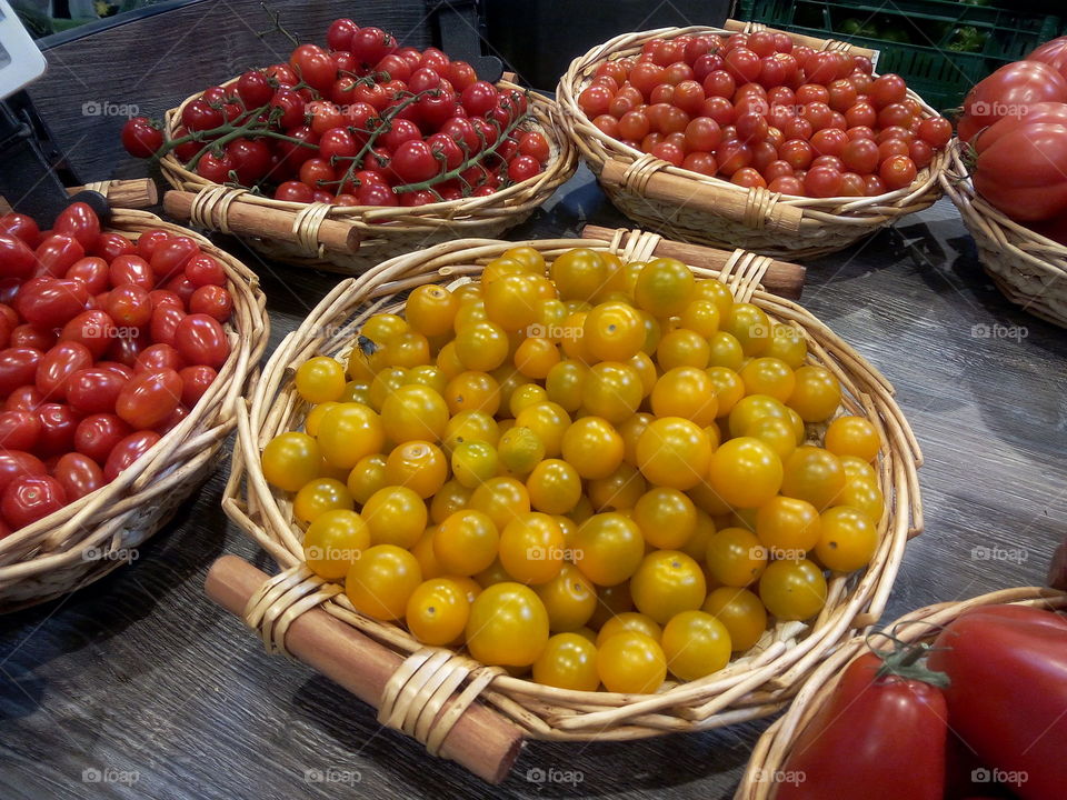 Various baskets - Choice of different tomatoes - Cocktail and cherry tomatoes - Plenty of red and yellow tomatoes