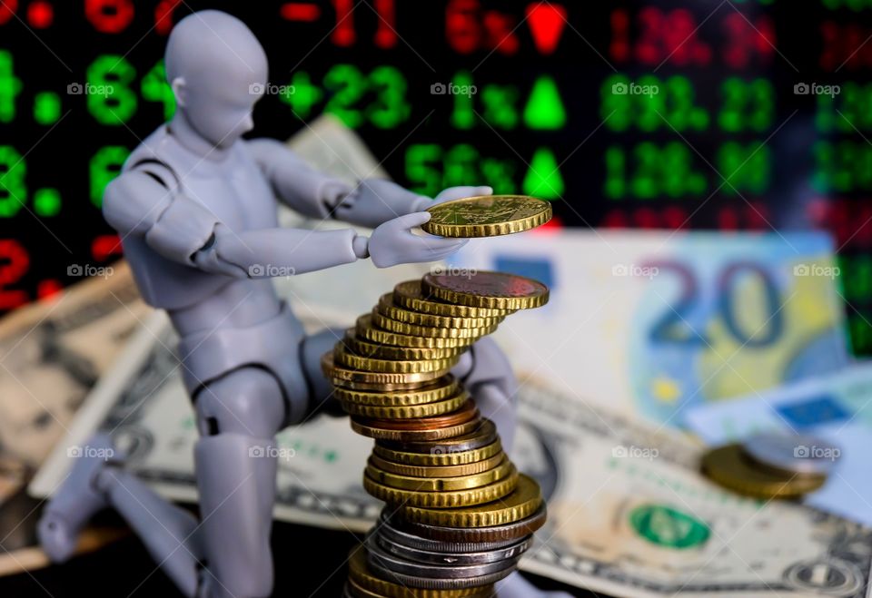 Robot stacking money in trading environment