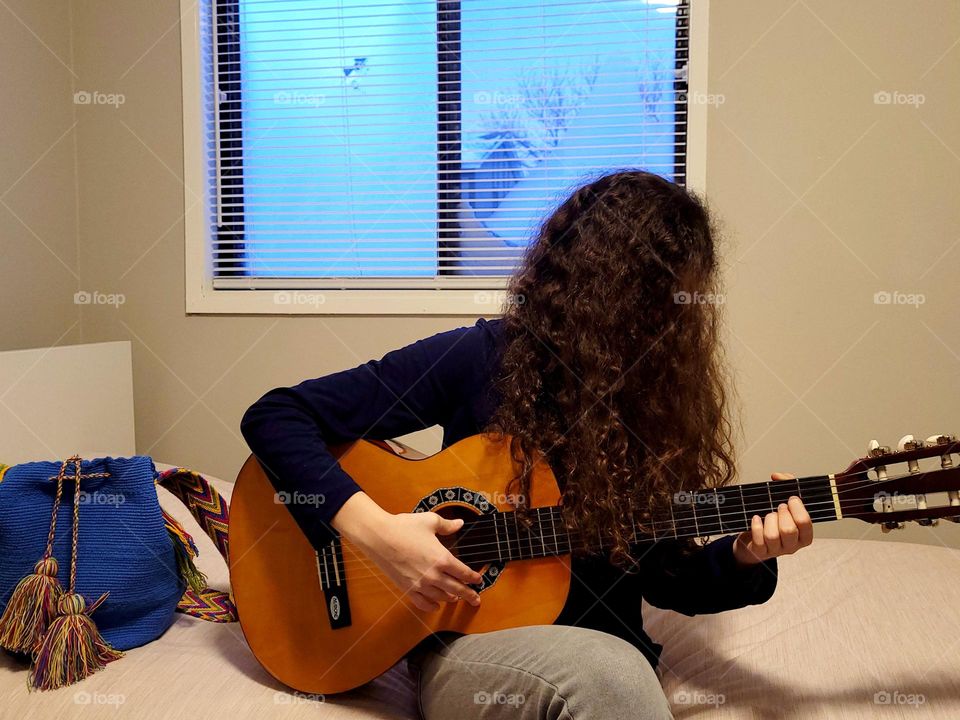 playing guitar