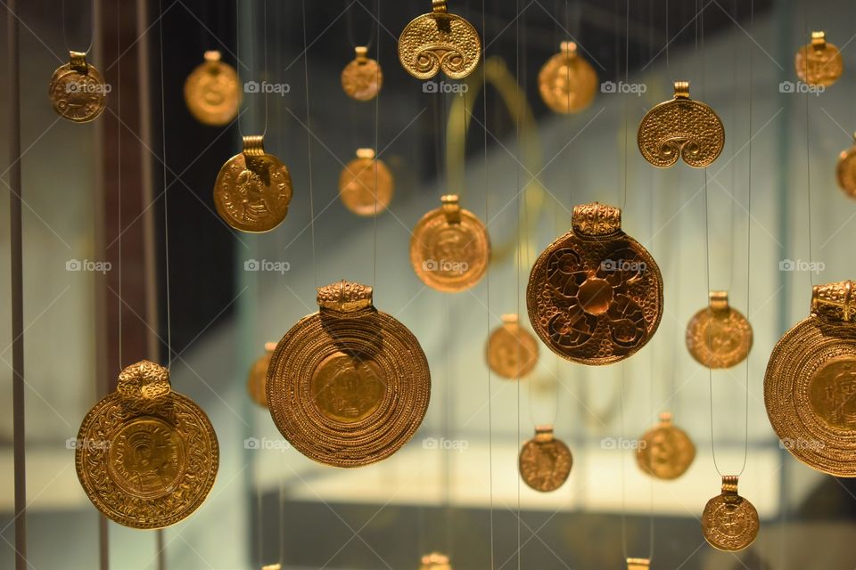 Golden pieces at an exhibition. The smell of wealth! Can you smell it?