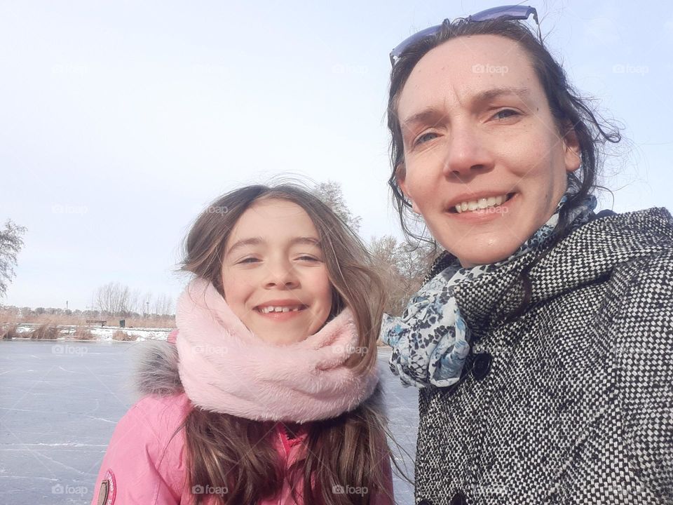 Winter wonder time mother and daughter.