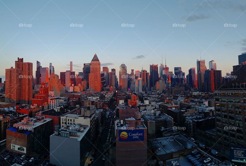 New York cityscape at sunset. Taken from the top roof bar 'The Press Lounge'