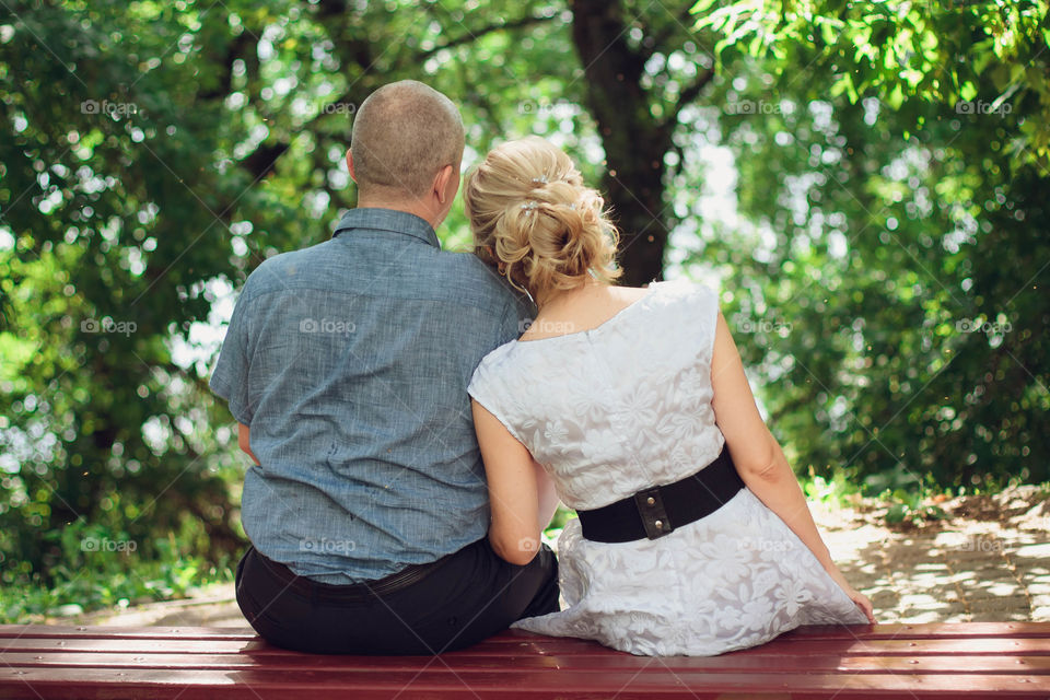 sit in the park on a bench