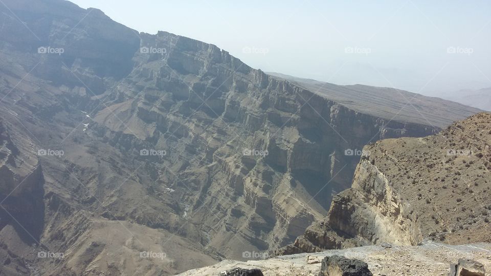 Grand Canyon of Oman. My parents and I did a road trip through Oman. this was taken at the top of Jabar Shams