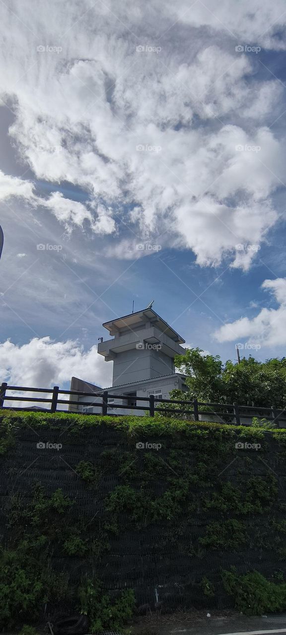 Looking up at the buildings and the sky
