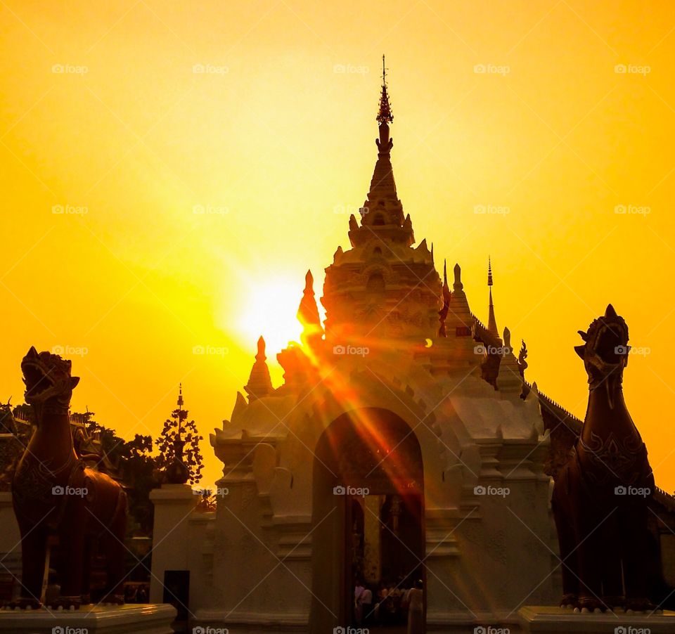 Sunset at Temple . Sunset at Wat Phrathat Hariphunchai,Lumphun,Thailand 