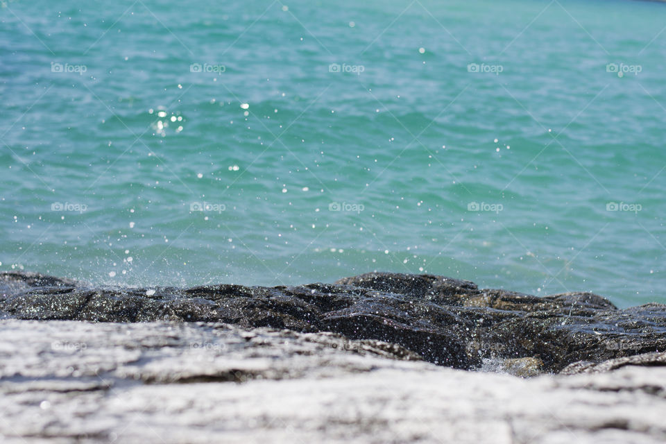 sea splashing at rocks. sea splashing at rocky beach