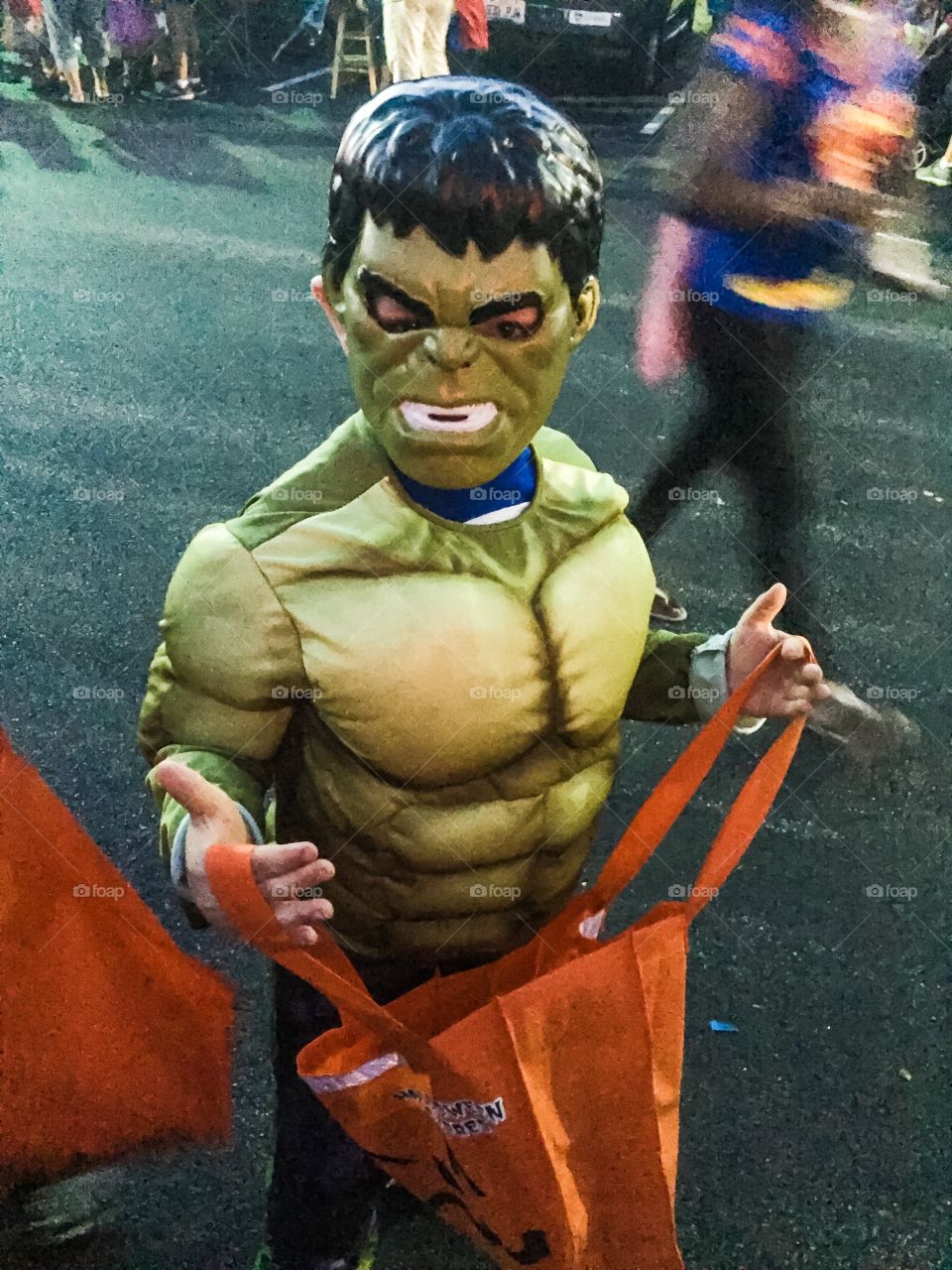 Boy dressed up as the hulk for Halloween costume party