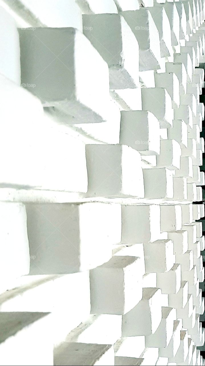 Wall of bricks or walls under a new perspective