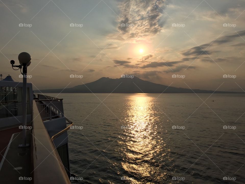 Sunrise Over Mt. Vesuvius. Snapped this photo early in the morning on our cruise ship while sailing into Naples, Italy.