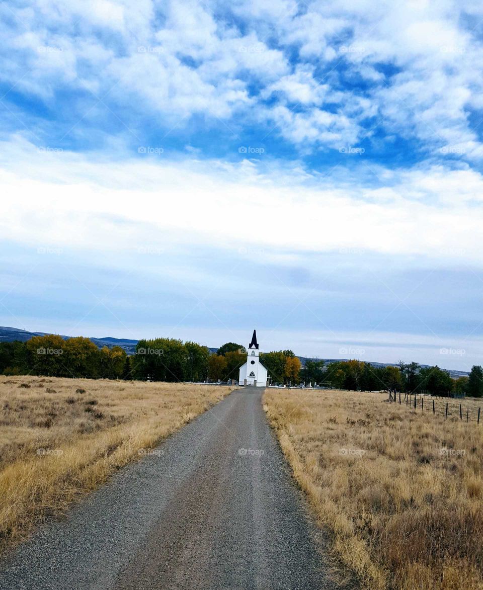 Little white church long gravel road