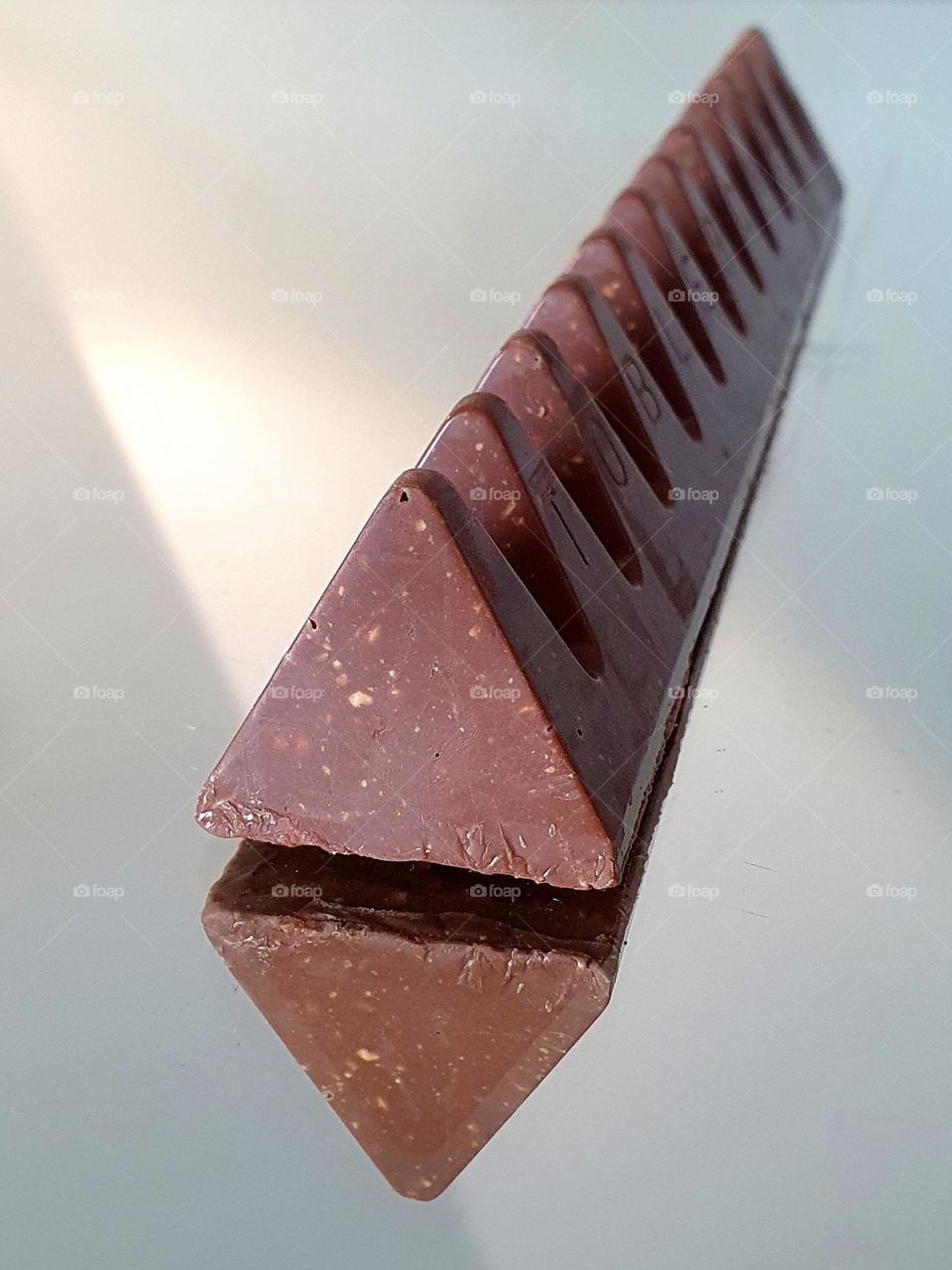 triangle - Toblerone - triangular chocolate with almonds - see double