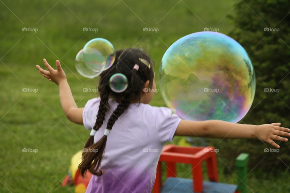 Catching a soapy bubble