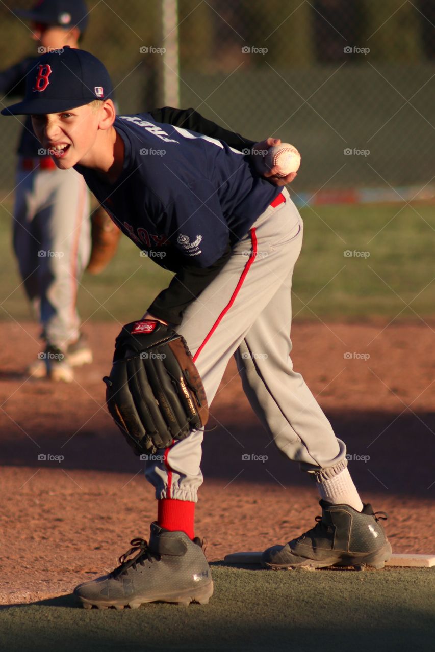 Baseball players playing in pitch