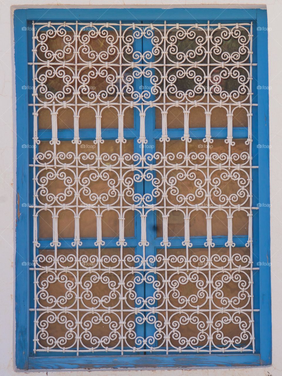 A colorful designed Moroccan window grating