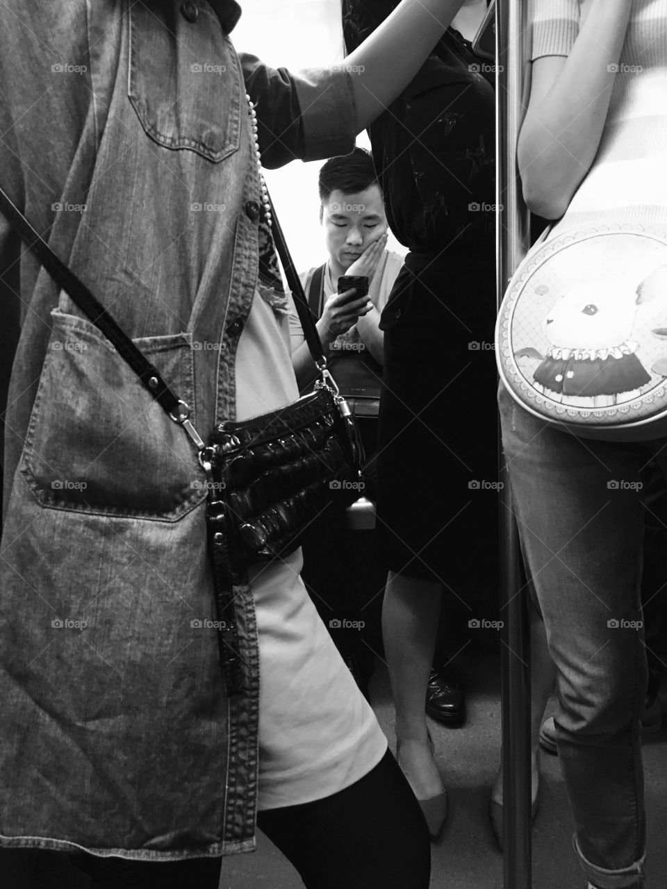 Chinese Man With Smartphone on Shenzhen Metro - China