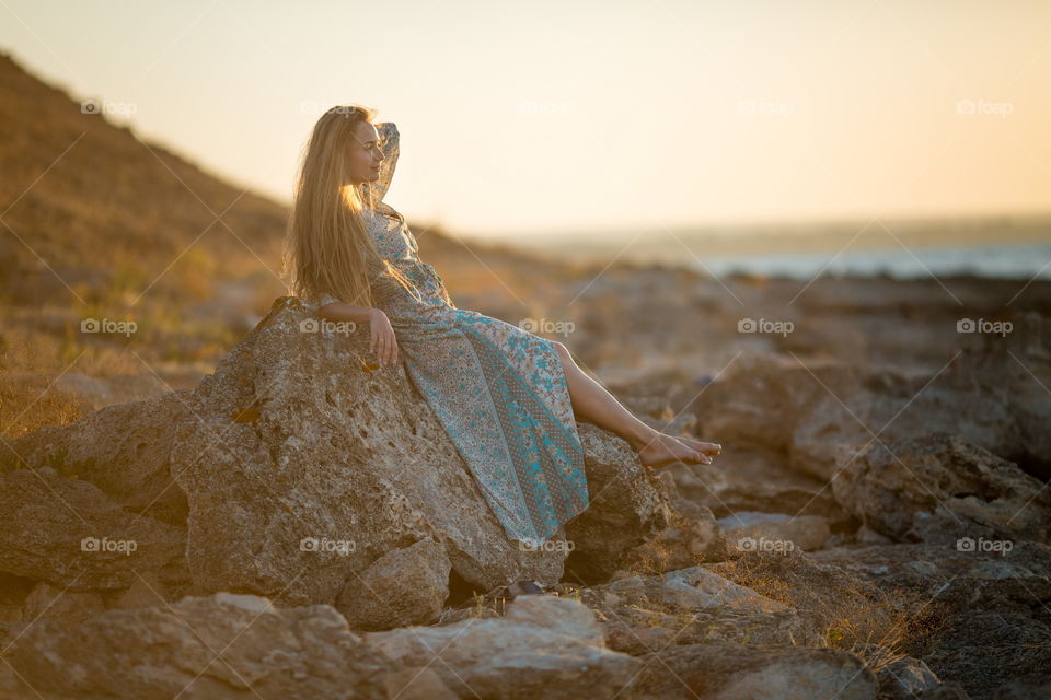 Portrait of beautiful young woman at outdoor