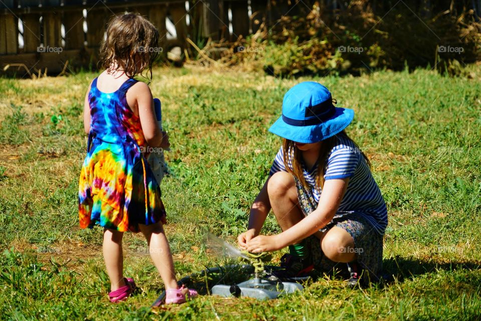 Girls Playing In The Summer Sun