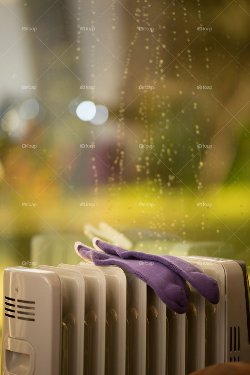 heater and socks in a rainy day