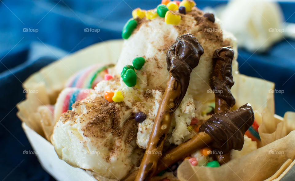 Vanilla ice cream with chocolate covered pretzels