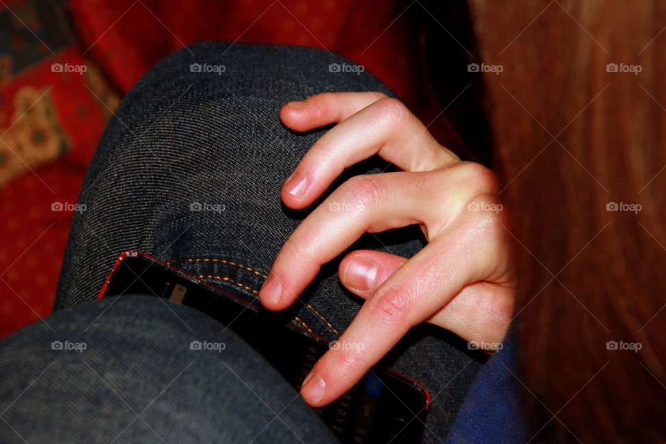 long girl fingers on the keypad