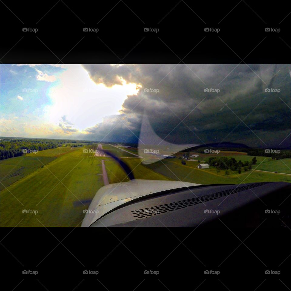 Cirrus Landing. A cirrus sr20 landing ahead of a thunderstorm 