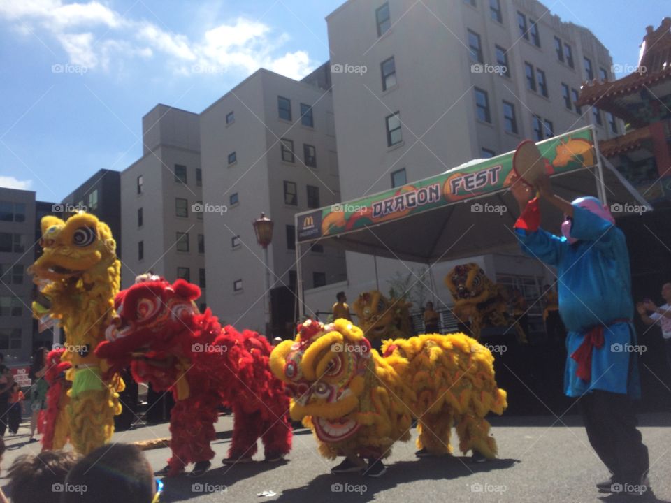 Three lion dancers at Seattle's Dragon Fest