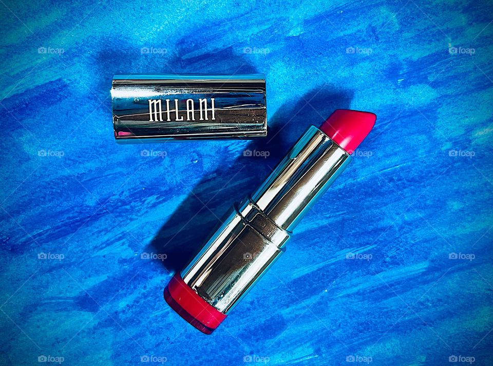 A bright, beautiful Milani lipstick, adds a stunning pop of color 