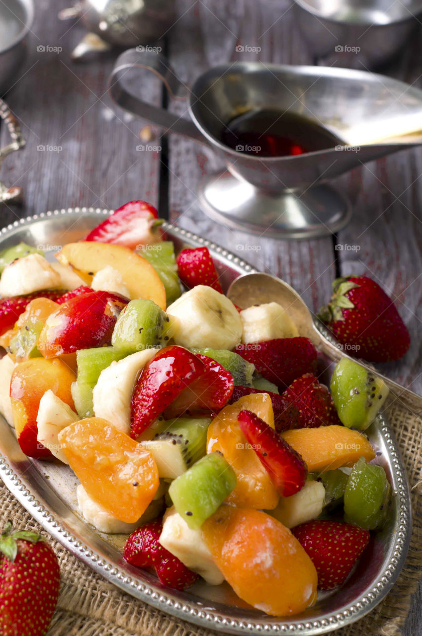 Chopped fresh fruits in plate