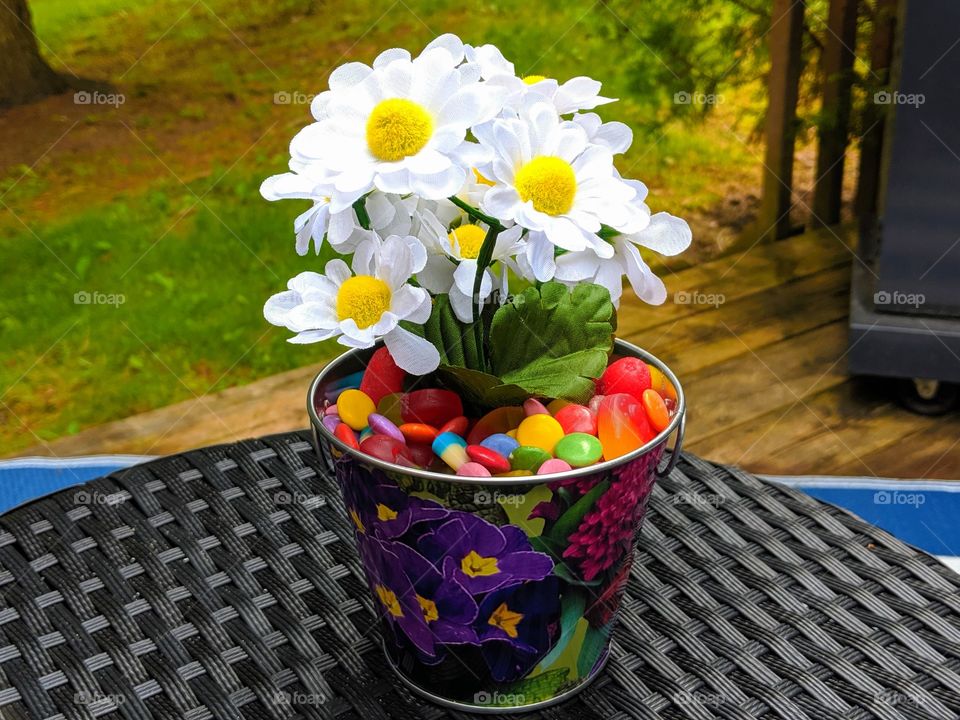 Flowers in a pot of candy
